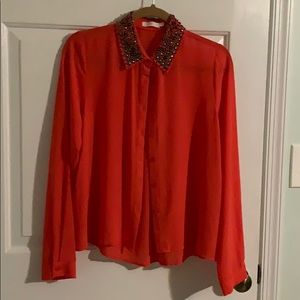 frilly feminine, translucently loose fun blouse.